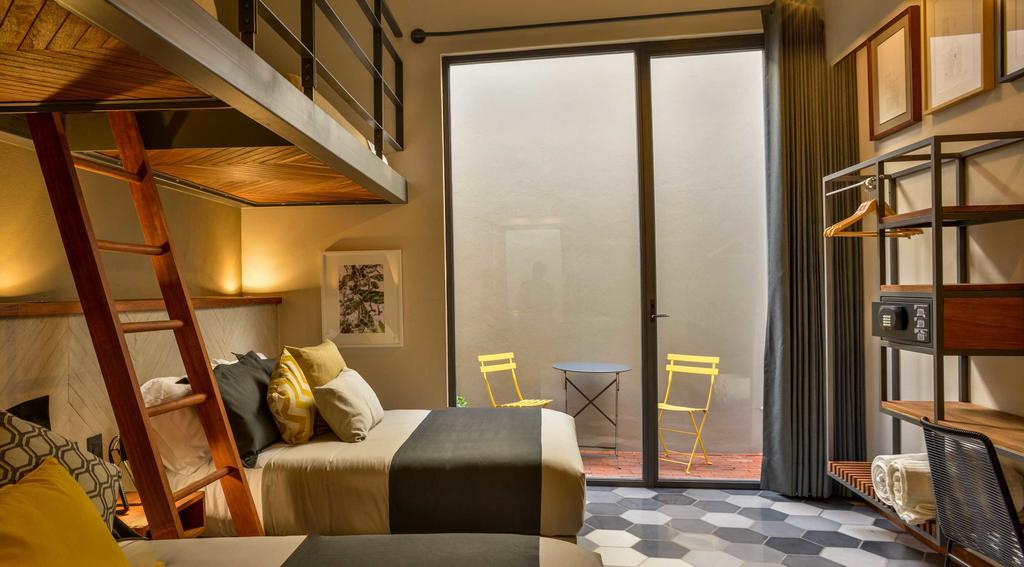 Hotel Criol Queretaro Luaran gambar A room at the hotel
