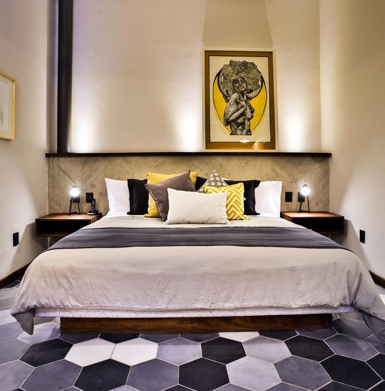 Hotel Criol Queretaro Luaran gambar A bedroom at the hotel